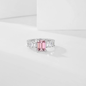 Detail of S925 sterling silver ring featuring a pink emerald cut zircon stone