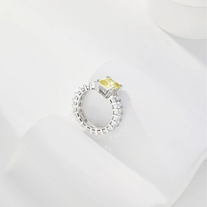 Macro detail of S925 sterling silver ring featuring a large yellow rectangular zircon