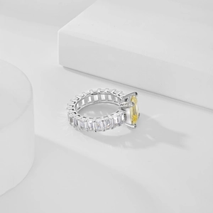 Detail of 925 silver ring with 8x10 yellow radiant cut zircon and pavé setting