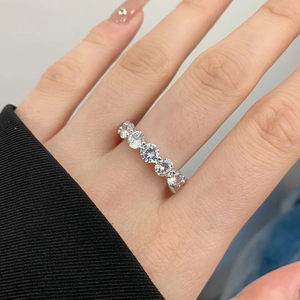 Classic S925 sterling silver eternity ring featuring five sparkling round-cut cubic zirconia