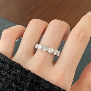 Close-up of S925 sterling silver band ring featuring round brilliant-cut zircons