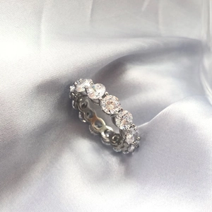 Macro view of S925 sterling silver eternity ring with zircon micro-pave setting