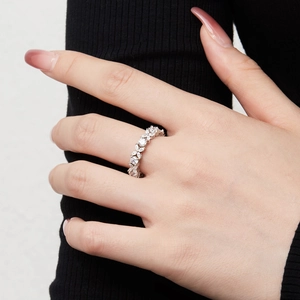Elegant S925 sterling silver flower ring with marquise and round zircon stones on finger