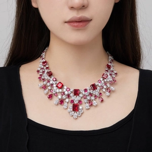 Close-up of luxury S925 sterling silver collar necklace with red rubies and zircon