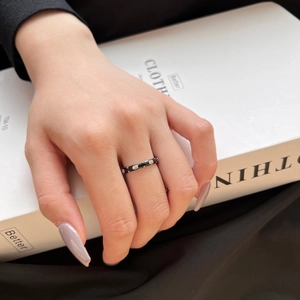 Minimalist S925 sterling silver black enamel ring with round cubic zirconia stones