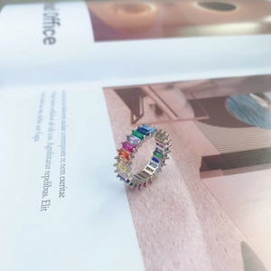 Macro shot of S925 sterling silver rainbow eternity ring with colorful rectangle zircons