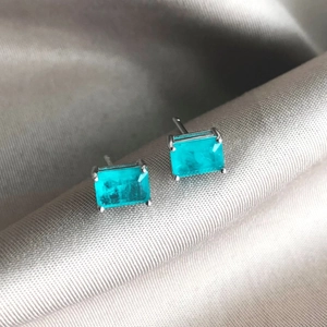 Detail of S925 sterling silver stud earrings with rectangular Paraiba blue zircon