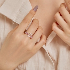 Adjustable S925 sterling silver ring with colorful rectangular gems worn by a model