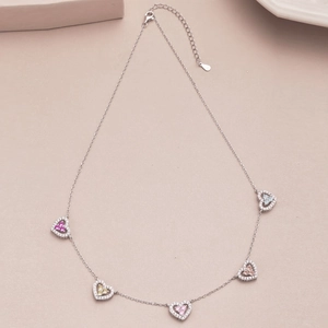 Detailed view of S925 silver necklace with five colorful heart-shaped zircon pendants