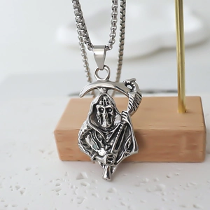 Silver Grim Reaper pendant necklace with a detailed box chain for a gothic street style