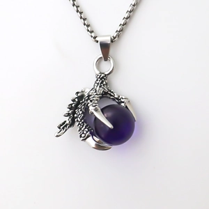 Gothic silver dragon claw necklace holding a purple orb with vintage punk chain