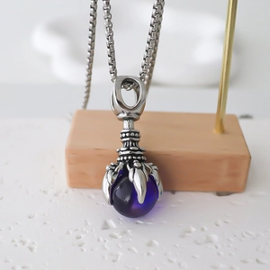 Vintage punk silver claw pendant with purple sphere on a sturdy stainless steel box chain