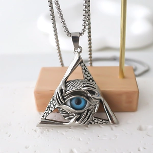 Vintage silver hollow triangle Eye of Horus pendant necklace with blue gemstone detail