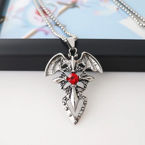 Gothic cross necklace for men with silver bat wings and a centered red zircon stone