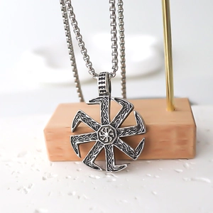 Vintage Kolovrat sun wheel pendant necklace in silver stainless steel with braided texture