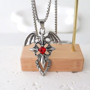 Gothic silver bat pendant necklace with center red gemstone on square link chain