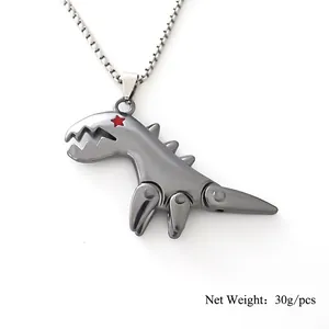Articulated dinosaur pendant necklace in gunmetal finish with red star detail