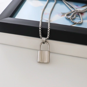 Sleek silver padlock pendant necklace with durable box chain for unisex urban fashion