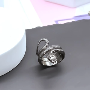 Macro shot of Black Mamba snake ring showing detailed scales and gunmetal finish