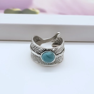Anello vintage a piuma in argento con turchese e design a fascia aperta regolabile