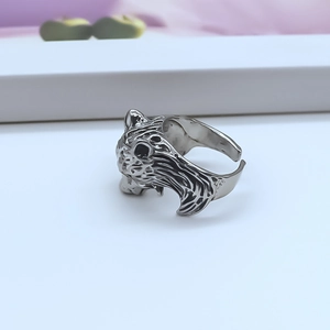 Detailed close-up of retro silver animal head ring with intricate fur textures and open band