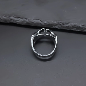 Retro silver alloy open ring featuring hands holding a hollow heart-shaped design