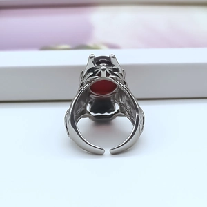 Detailed macro view of the vintage silver dragon ring with adjustable open band design