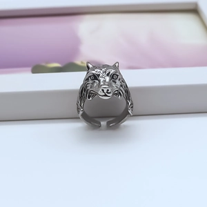 Detailed close-up of a wolf head open ring with a vintage silver alloy finish