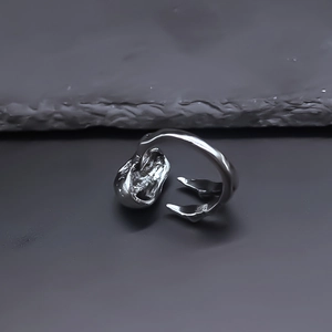 Men's retro silver alloy ring featuring a bold irregular molten lava texture and open design