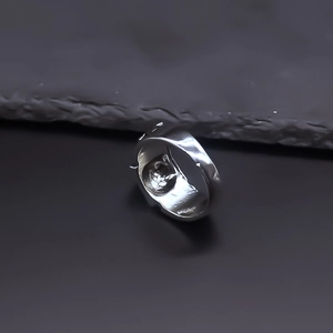 Vintage punk silver ring with liquid lava texture and irregular pyramid patterns