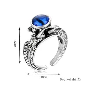 Vintage gothic adjustable alloy ring with blue cat eye stone and wing relief carvings