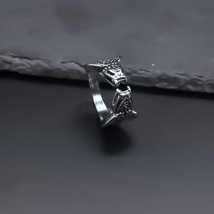 Macro shot of retro double-headed wolf open ring with vintage silver plating finish