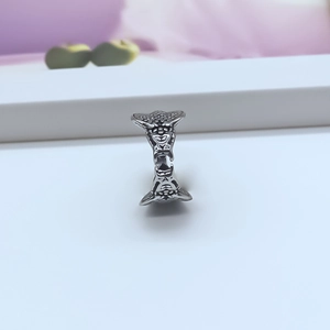 Macro detail of retro silver-plated snake ring with intricate 3D relief texture and finish