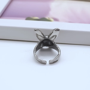 Detailed view of the silver rabbit ear alloy ring featuring an adjustable open band design