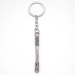 Silver metal Ruyi Jingu Bang keychain pendant with intricate classical relief patterns