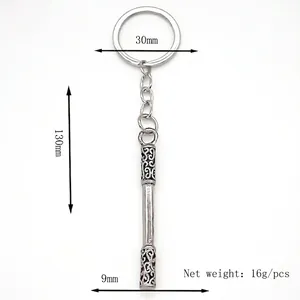 Silver Monkey King staff metal keychain with intricate hollow cloud patterns, 130mm long