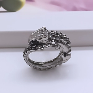 Retro punk style adjustable eagle beak ring with detailed lizard scale texture and gothic finish