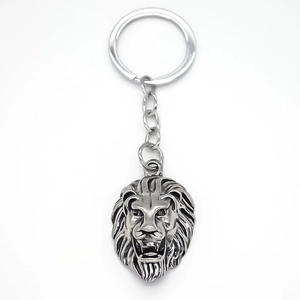 Vintage lion head keychain with antique silver finish and detailed mane relief carving