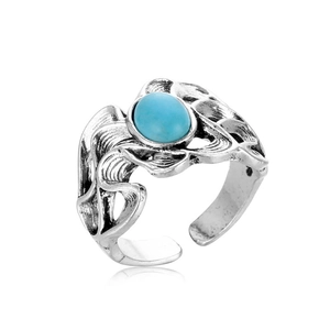Vintage silver-tone open ring for men featuring an oval turquoise stone and hollow patterns
