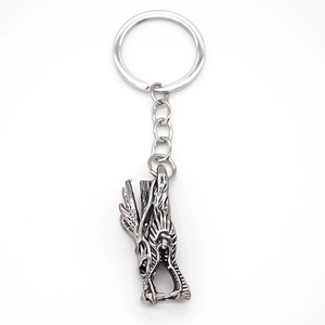 Porte-clés tête de dragon traditionnel en alliage argenté antique finement sculpté