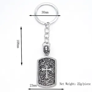Porte-clés pendentif croix argenté rétro avec texture de vague gravée style punk