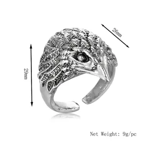 Vintage eagle head open ring in punk style with detailed feathers and silver finish