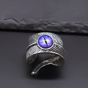 Vintage wing textured alloy ring for men featuring a central purple cat eye stone