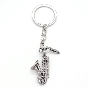 Creative silver saxophone shaped metal keychain for men and women bag accessories