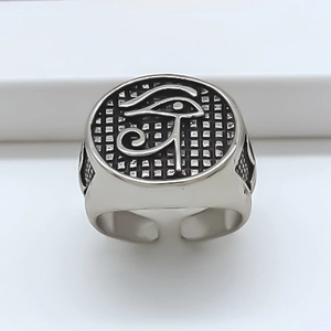 Detail of adjustable silver ring with embossed Eye of Horus and textured grid pattern