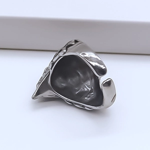 Detailed macro view of vintage eagle head engraved adjustable punk alloy ring for men