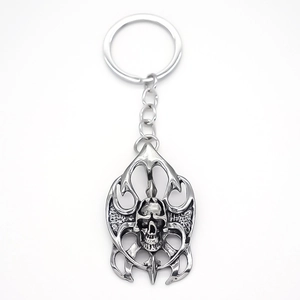 Gothic silver alloy keychain with hollow skull pendant and street style punk design