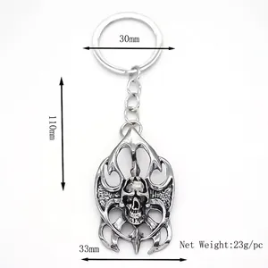Gothic skull metal keychain with vintage silver finish and flame pattern for men