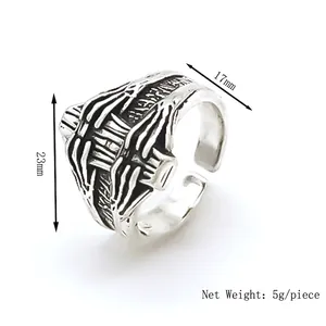 Retro punk skull hand open ring in antique silver finish with oxidized details for men