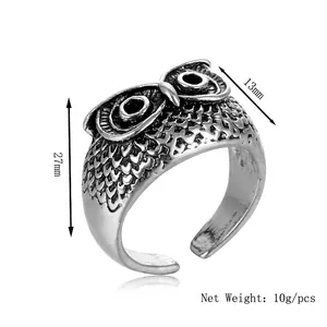 Vintage adjustable owl ring in silver alloy with detailed feather textures and 13mm width